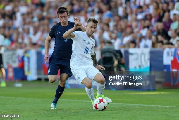 Albert Rusnak of Slovakia and Ben Chilwell of England battle for the ball during the 2017 UEFA European Under-21 Championship match between Slovakia...