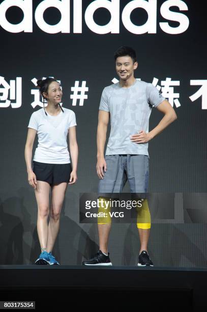 Actress Chun-Ning Chang and Chinese swimmer Ning Zetao attend the adidas event on June 29, 2017 in Shanghai, China.