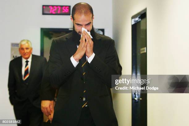 Bachar Houli of the Richmond Tigers leaves the hearing room before deliberation. He received a four week suspension at the AFL Appeals trial at AFL...