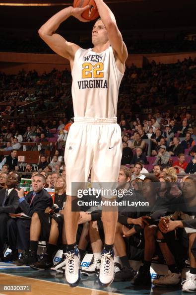 Alex Ruffa Alex Ruoff of the West Virginia Mountaineers takes a jump shot... News ...