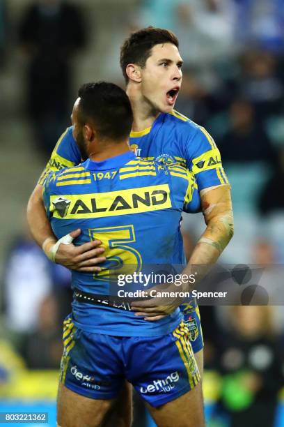 Mitchell Moses of the Eels celebrates kicking the winning field goal in extra-time during the round 17 NRL match between the Parramatta Eels and the...