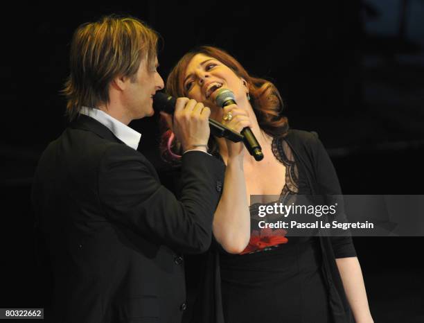 David Hallyday and Agnes Jaoui perform on stage during the Fight Aids Monaco Gala on March 20, 2008 in Monaco.