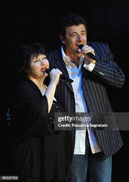 Singers Maurane and Patrick Bruel perform on stage during the Fight Aids Monaco Gala on March 20, 2008 in Monaco.