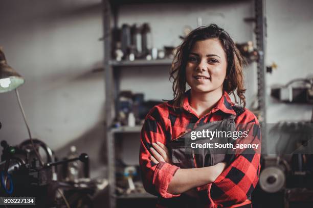 woman in a workshop - repairman stock pictures, royalty-free photos & images