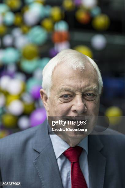 Chris Patten, Hong Kong's last colonial governor, poses for a photograph following a Bloomberg Television interview in London, U.K., on Thursday,...