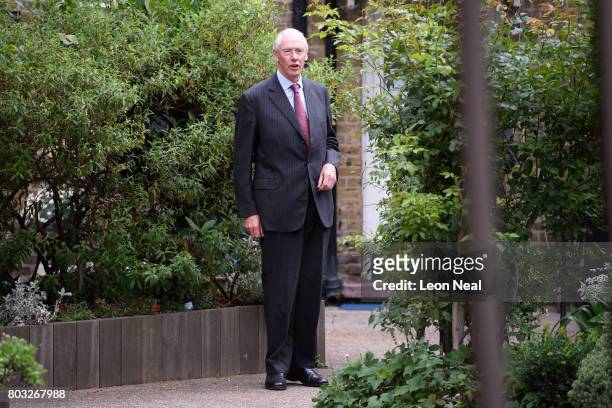 Sir Martin Moore-Bick leaves the Parish of St Clement church after meeting local residents on June 29, 2017 in London, England. The retired Court of...