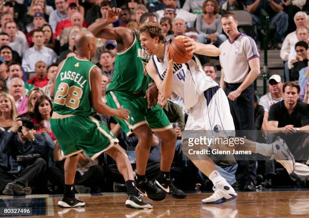 Dirk Nowitzki of the Dallas Mavericks drives to the basket against Sam Cassell of the Boston Celtics on March 20, 2008 at the American Airlines...