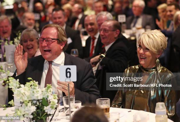 Kevin Sheedy and his wife Geraldine Currie laugh during the '50 Years of Sheeds' Dinner on June 29, 2017 in Melbourne, Australia.