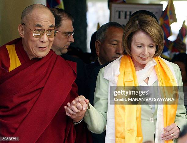 Tibetan spiritual leader in-exile, His Holiness the Dalai Lama shows US House of Representatives Speaker Nancy Pelosi the palace temple in Dharamsala...