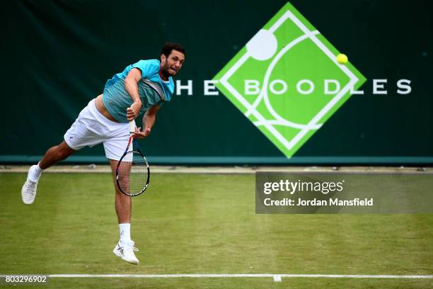 James Ward of Great Britain serves during his match against Albert Ramos-Vinolas of Spain during day three of The Boodles Tennis Event at Stoke Park...