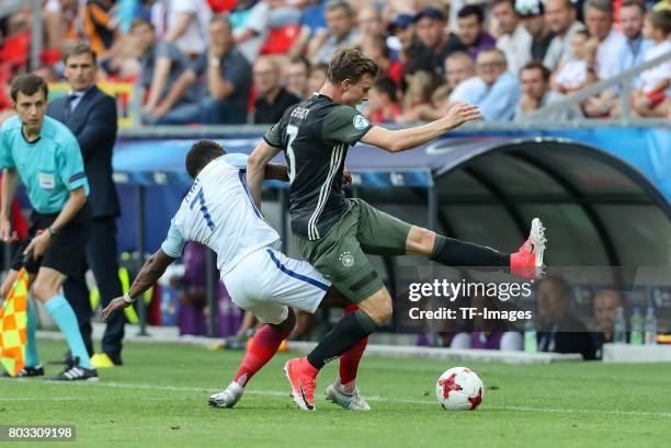 Demarai Gray of England and Yannick Gerhardt of Germany battle for the ball during the UEFA European Under-21 Championship Semi Final match between...