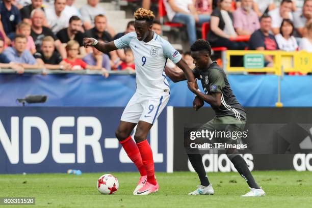 Tammy Abraham of England and Gideon Jung of Germany battle for the ball during the UEFA European Under-21 Championship Semi Final match between...