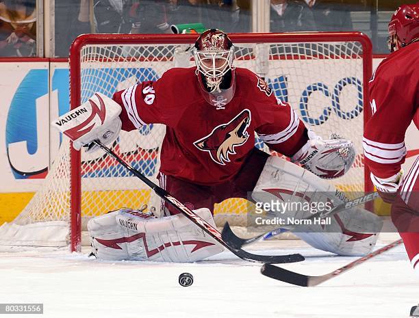 Goaltender Ilya Bryzgalov of the Phoenix Coyotes watches the puck bounce toward the net against the Edmonton Oilers on March 15, 2008 at Jobing.com...