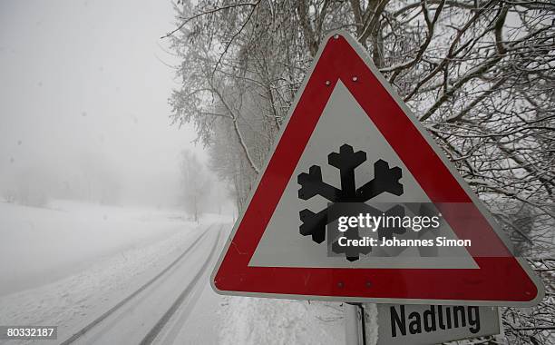 Road sign depicting a snow flake is seen beside a street on March 21, 2008 in Nadling near Deggendorf, Germany. Currently, parts of Germany are hit...