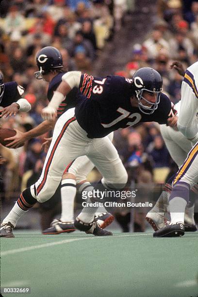 Tackle Steve Wright of the Chicago Bears fires off to block
