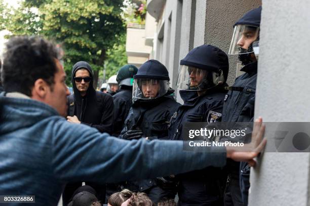Demonstrator discussed with riot police at a blockade in Berlin, Germany on 29 June 2017. The shop in the district Neuklln was terminated in April...