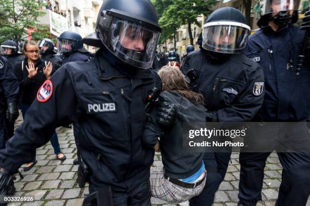 Riot policemen evict the blockade in front of the shop in Berlin, Germany on 29 June 2017. The shop in the district Neuklln was terminated in April...