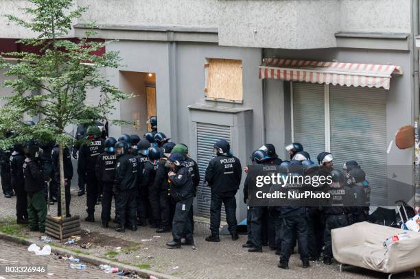 Riot policemen gain access into a neighbouring house in Berlin, Germany on 29 June 2017. The shop in the district Neuklln was terminated in April...