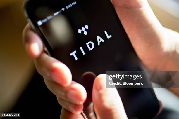 The Tidal application is seen on an Apple Inc. IPhone arranged for a photograph in Washington, D.C., U.S., on Tuesday, June 27, 2017. Jay Z's new...