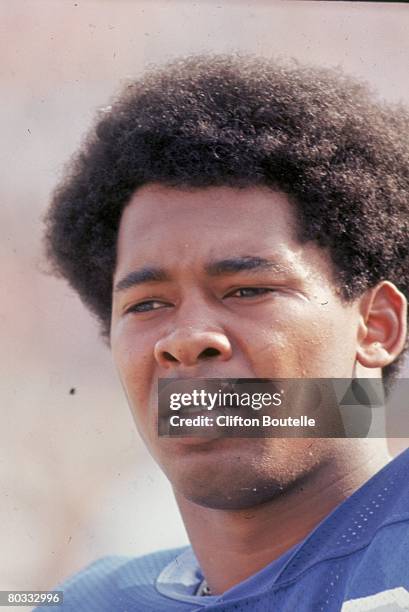 Tight end Charlie Sanders of the Detroit Lions watches from the sideline against the Cleveland Browns during a preseason game at Michigan Stadium on...
