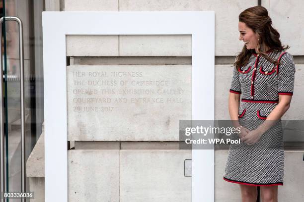 Catherine, Duchess of Cambridge unveils a plaque at the V&A museum to open the new multi million pound extension on June 29, 2017 in London, England....