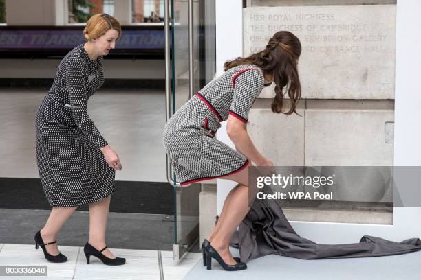 Catherine, Duchess of Cambridge unveils a plaque at the V&A museum to open the new multi million pound extension on June 29, 2017 in London, England....