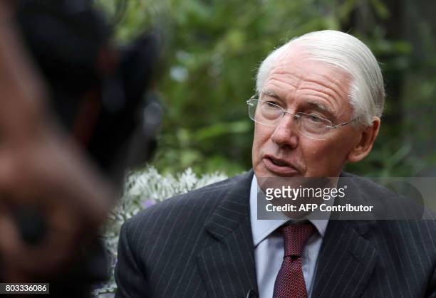 Retired Court of Appeal judge Sir Martin Moore-Bick, who will lead the Grenfell Tower fire public inquiry, speaks to the media outside St Clement's...