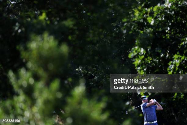 Ricky Barnes of the United States plays his shot from the 14th tee during the first round of the Quicken Loans National on June 29, 2017 TPC Potomac...