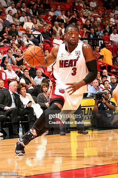 Dwyane Wade of the Miami Heat drives to the basket during the game against the Toronto Raptors on February 4, 2008 at American Airlines Arena in...