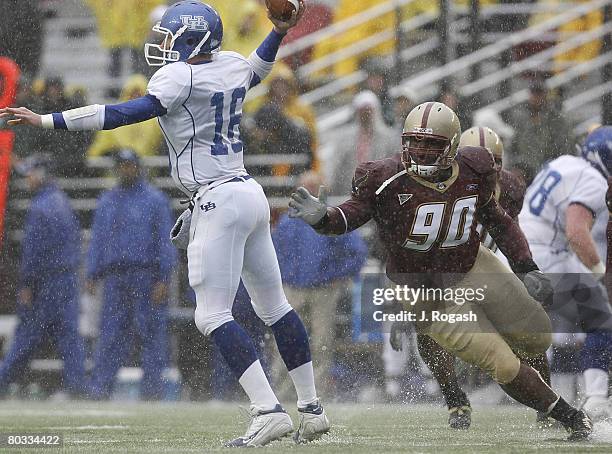 Boston College's B.J. Raji, right, has his eyes on Drew Willy of Buffalo at the Alumni Stadium, Massachusetts, Saturday, October 28, 2006.