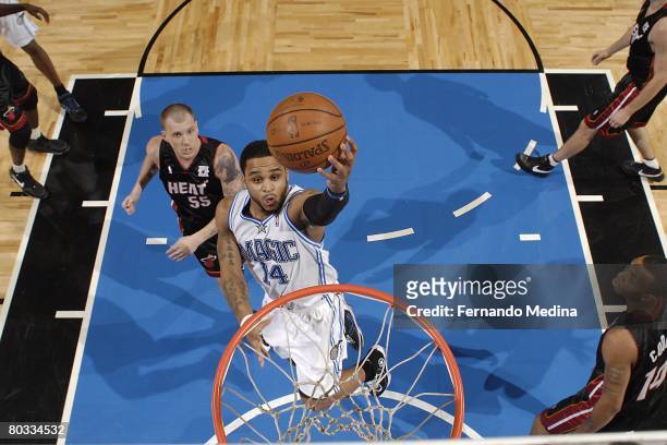 Jameer Nelson of the Orlando Magic goes up for the shot during the NBA game against the Miami Heat at Amway Arena on January 30, 2008 in Orlando,...