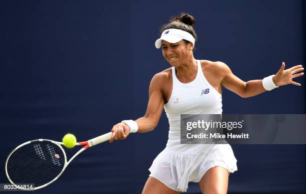 Heather Watson of Great Britain hits a forehand during the ladies singles round of 16 match against Anastasia Pavlyuchenkova of Russia on day five of...