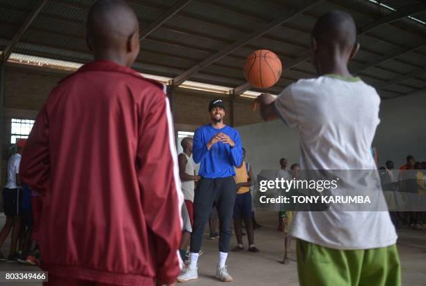 Professional basketball player for the Golden State Warriors of the National Basketball Association James Michael McAdoo receives a pass June 29,...