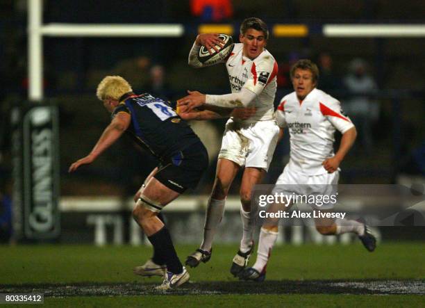 Toby Flood of Newcastle Falcons beats Rhys Oakley of Leeds Carnegie during the Guinness Premiership match between Leeds Carnegie and Newcastle...