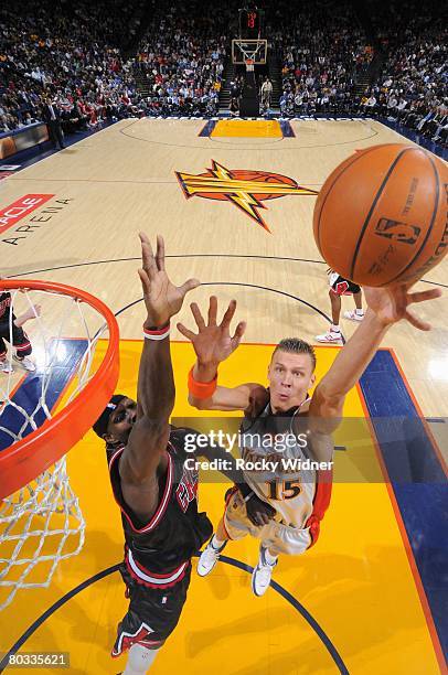 Andris Biedrins of the Golden State Warriors goes up for the shot during the NBA game against the Chicago Bulls at Oracle Arena in Oakland on...