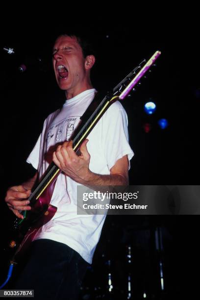 American Rock musician Page Hamilton, of the group Helmet, plays guitar as he performs onstage during the LifeBeat Board Aid 2 benefit concert at the...