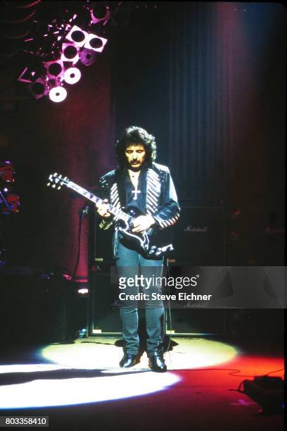 English Rock musician Tony Iommi, of the group Black Sabbath, plays guitar as he performs onstage at the Ritz, New York, New York, October 14, 1992.
