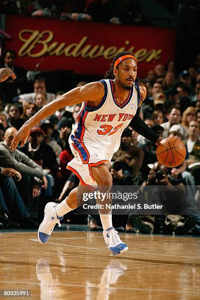 Renaldo Balkman of the New York Knicks dribbles against the San Antonio Spurs during the game on February 8, 2008 at Madison Square Garden in New...