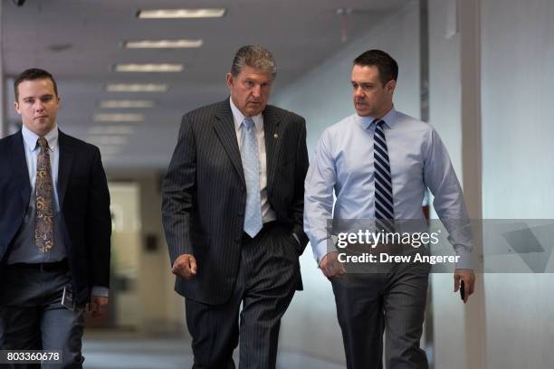 Sen. Joe Manchin arrives for a closed hearing of the Senate Intelligence Committee, June 29, 2017 in Washington, DC. Committee leaders said on...