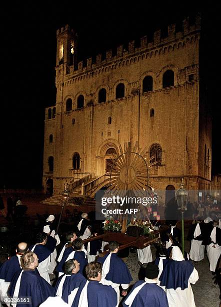 Italian Christian take part in the Good Friday procession through the streets of Gubbio, Umbria, on March 21, 2008. The "Processione del Cristo...