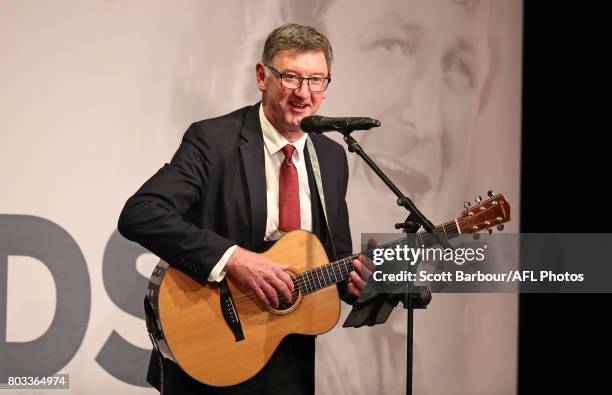 Simon Madden plays the guitar during the '50 Years of Sheeds' Dinner on June 29, 2017 in Melbourne, Australia.