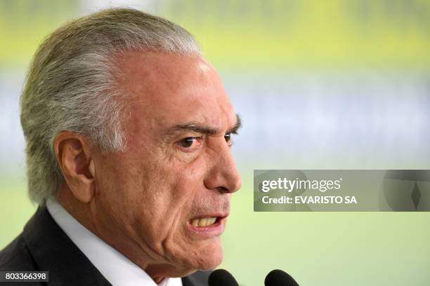 Brazilian President Michel Temer speaks during a ceremony to celebrate the 1st anniversary of the Accountability Act of State Companies, at Planalto...