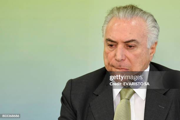 Brazilian President Michel Temer attends a ceremony to celebrate the 1st anniversary of the Accountability Act of State Companies, at Planalto Palace...
