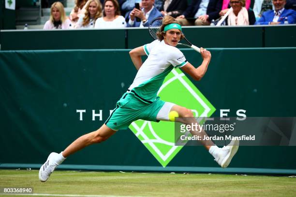 Alexander Zverev of Germany plays a backhand during his match against Thanasi Kokkinakis of Australia during day three of The Boodles Tennis Event at...