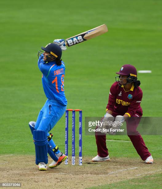 India batsman Smriti Mandhana hits out during the ICC Women's World Cup 2017 match between West Indies and India at The County Ground on June 29,...