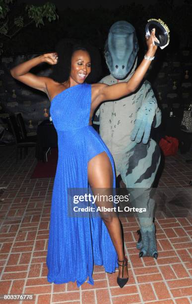 Actress Sydelle Noel of "Glow" dances with Kevin Fox as a Velociraptor at the 43rd Annual Saturn Awards - After Party held at The Castaway on June...