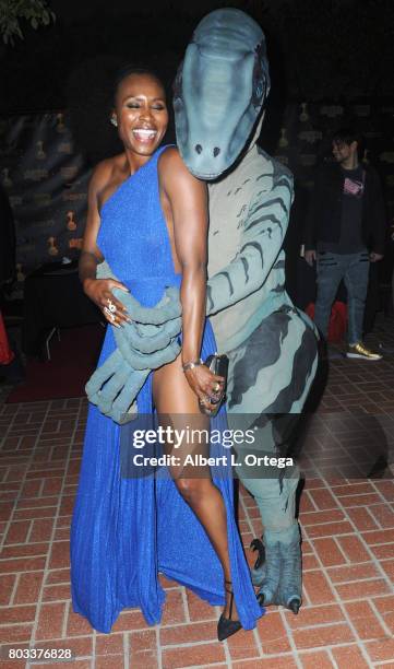 Actress Sydelle Noel of "Glow" dances with Kevin Fox as a Velociraptor at the 43rd Annual Saturn Awards - After Party held at The Castaway on June...