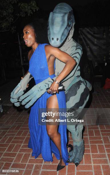 Actress Sydelle Noel of "Glow" dances with Kevin Fox as a Velociraptor at the 43rd Annual Saturn Awards - After Party held at The Castaway on June...