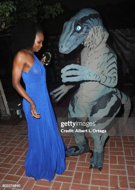 Actress Sydelle Noel of "Glow" dances with Kevin Fox as a Velociraptor at the 43rd Annual Saturn Awards - After Party held at The Castaway on June...