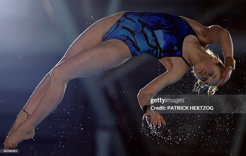 Russia's Olga Vintonyak dives during the